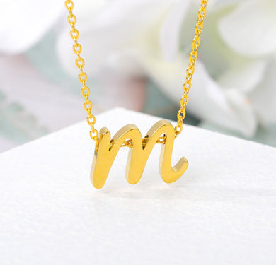 Gold Cursive Initial Letter